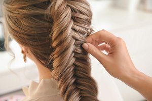 Dark blonde hair in a fishtail bridal braid